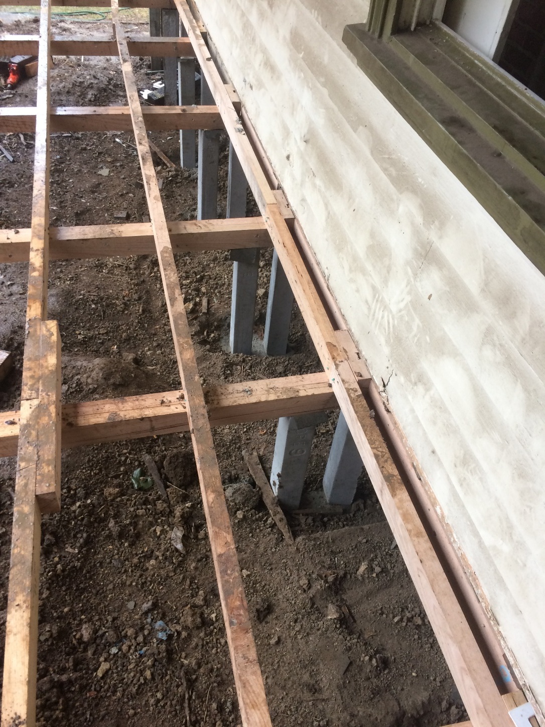 A wooden frame on the ground